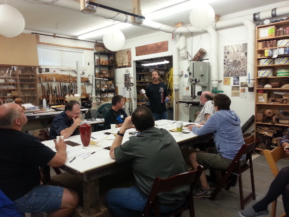 David giving students instructions for their sample boards.