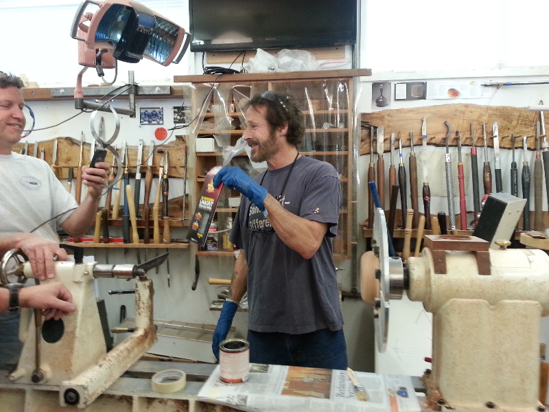 David demos wet sanding for the class.