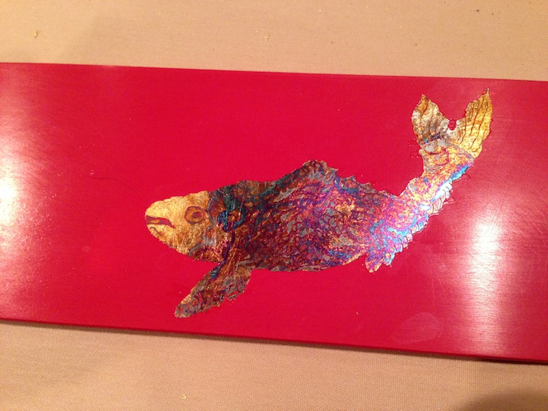 Demo sample of gilded fish. Silver leaf with chemical patina.