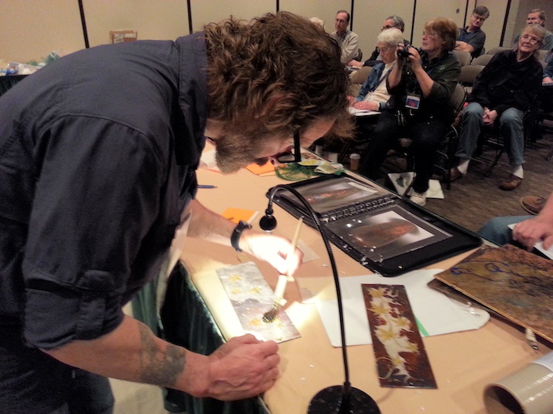 David Marks demonstrates gilding Japanese maple leaves with 22 Karat Gold against a silver leaf background